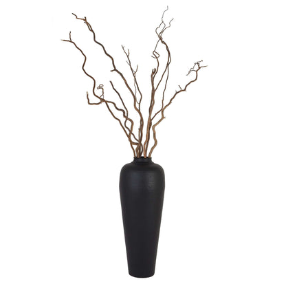 Large Hammered Vase | Description The meticulously crafted Large Hammered Vase in Matt Black comes with a lid and adds stylish charm to any space. Pair it with twisted hazel branches for a chic, floor-standing display. This modern piece makes a bold state