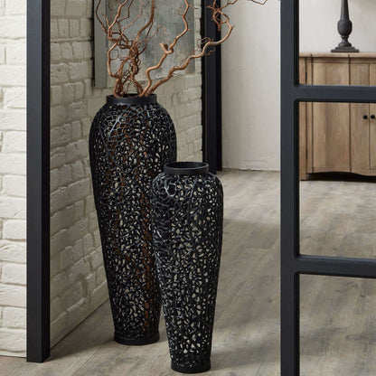 Black Cast Lattice Medium Vase | Transform Your Space with Our Black Cast Lattice Medium Vase Description Elevate your home decor with the modern elegance of our Black Cast Lattice Medium Vase. Crafted from perforated steel, this floor-standing vase is de