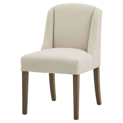 Compton Boucle Dining Chair | Description Introducing the Compton Boucle Dining Chair - a perfect blend of style and functionality. Crafted with a sturdy rubberwood frame, it offers strength and durability for everyday use. The cream boucle upholstery and