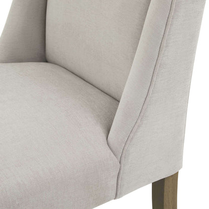 Compton Boucle Dining Chair | Description Introducing the Compton Boucle Dining Chair - a perfect blend of style and functionality. Crafted with a sturdy rubberwood frame, it offers strength and durability for everyday use. The cream boucle upholstery and