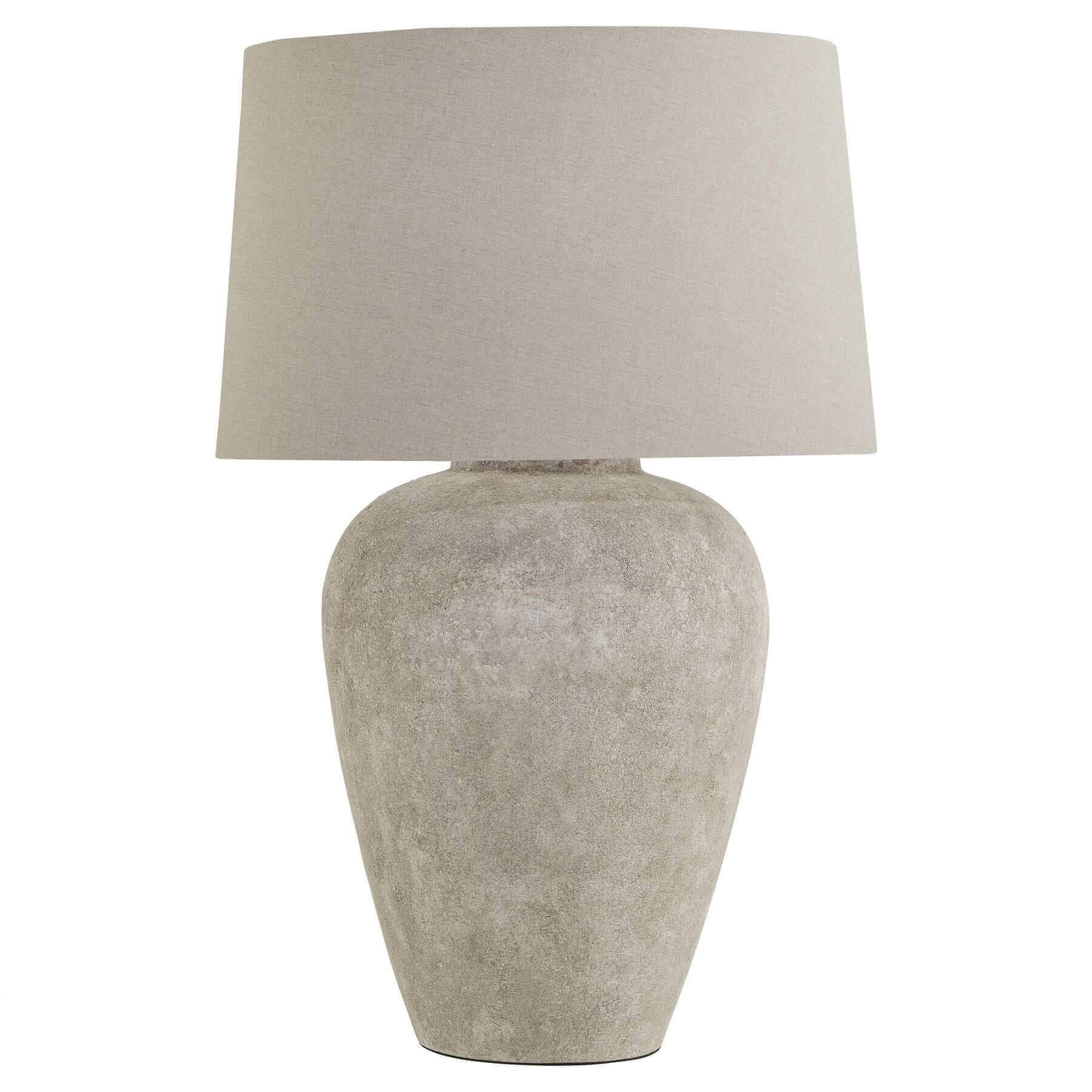 Athena Stone Table Lamp | Illuminate Your Space with Timeless Elegance: Athena Stone Table Lamp Description The Athena Stone Table Lamp is a perfect blend of classic design and modern functionality. Made from high-quality ceramic, this lamp features an ag