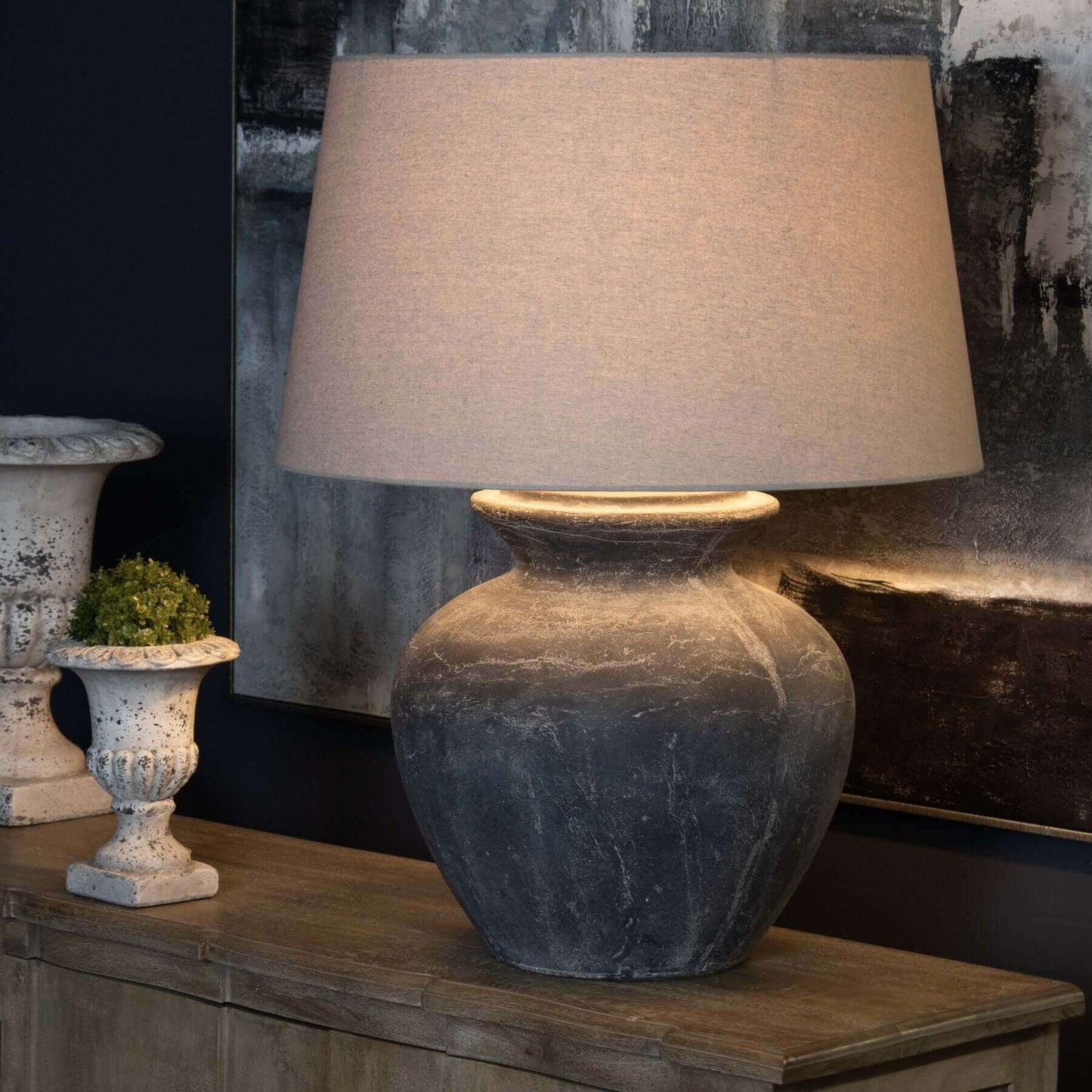 Amalfi Grey Table Lamp | Transform Your Space with the Amalfi Grey Table Lamp Where Elegance Meets Light Description Introducing the epitome of refined elegance for your home, the Amalfi Grey Table Lamp. This exquisite piece is designed to elevate any roo