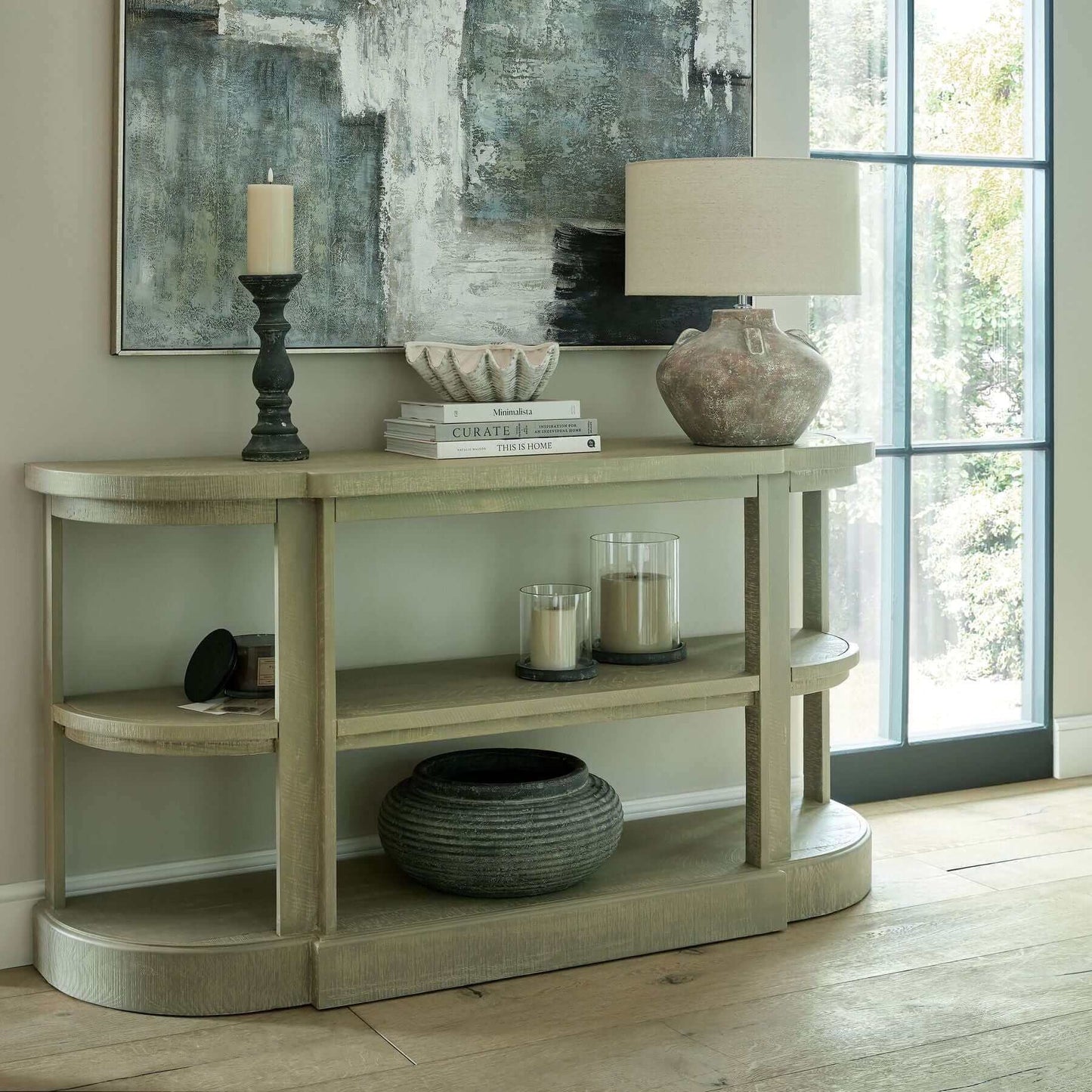 Saltaire Console Table | Description Introducing The Saltaire Console Table, where contemporary design meets timeless sophistication. Immerse yourself in the on-trend allure of curved elements and smooth outlines, meticulously crafted to embody a sense of