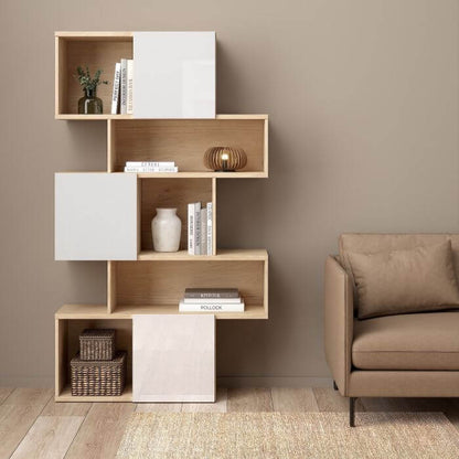 Maze Wall Unit with Jackson Hickory and White high gloss finish, showcasing decor items and books in a chic, asymmetrical design.