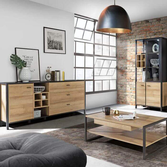 High Rock Large Sideboard | Description High Rock is a modern collection that combines the elegance of Riviera Oak decor with bold black accents. With unique touches like sleek black metal handles and sturdy metal legs in a frame-like design, this collect