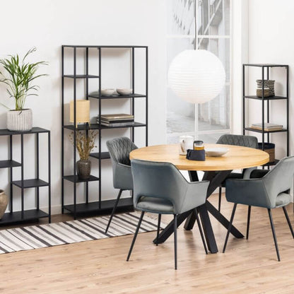 Modern living room featuring Newcastle Wall Unit with asymmetrical shelves, round dining table, and stylish chairs