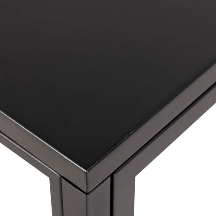 Close-up of the matte black rough powder-coated steel finish on the Newcastle Low Display Cabinet.