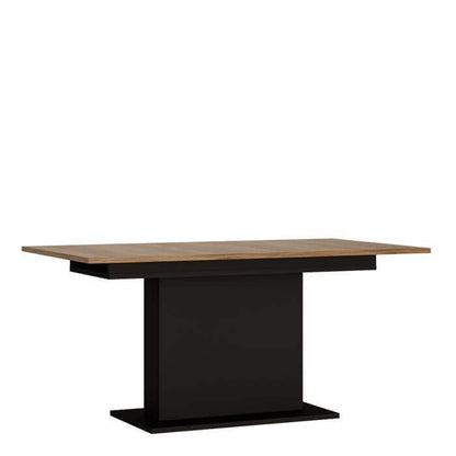 Brolo Extendable Dining Table | Description This table offers a modern take on the classic design, featuring a central pillar rather than corner legs for a cohesive look. Furthermore, it also has the ability to extend from 160cm to 200cm when extra surfac